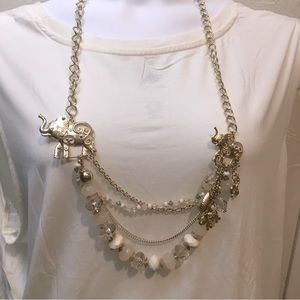 Gold tone beaded elephant necklace